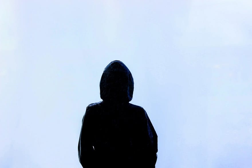 An unknown person wearing a hoodie